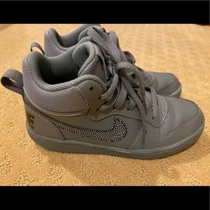 Nike high tops in gray leather size 4.5 youth